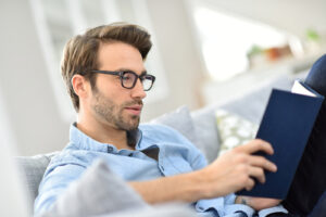 man reading book